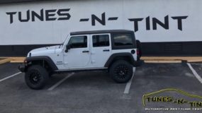 Jeep Wrangler Lifted w/ Wheels & Tires by Tunes-N-Tint