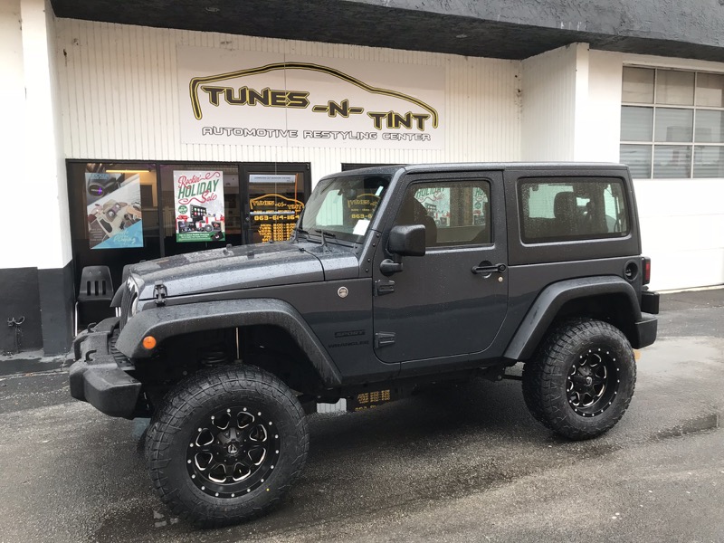 Auburndale Client Upgrades Jeep Wrangler Sport Suspension and Wheels —  Tunes-N-Tint